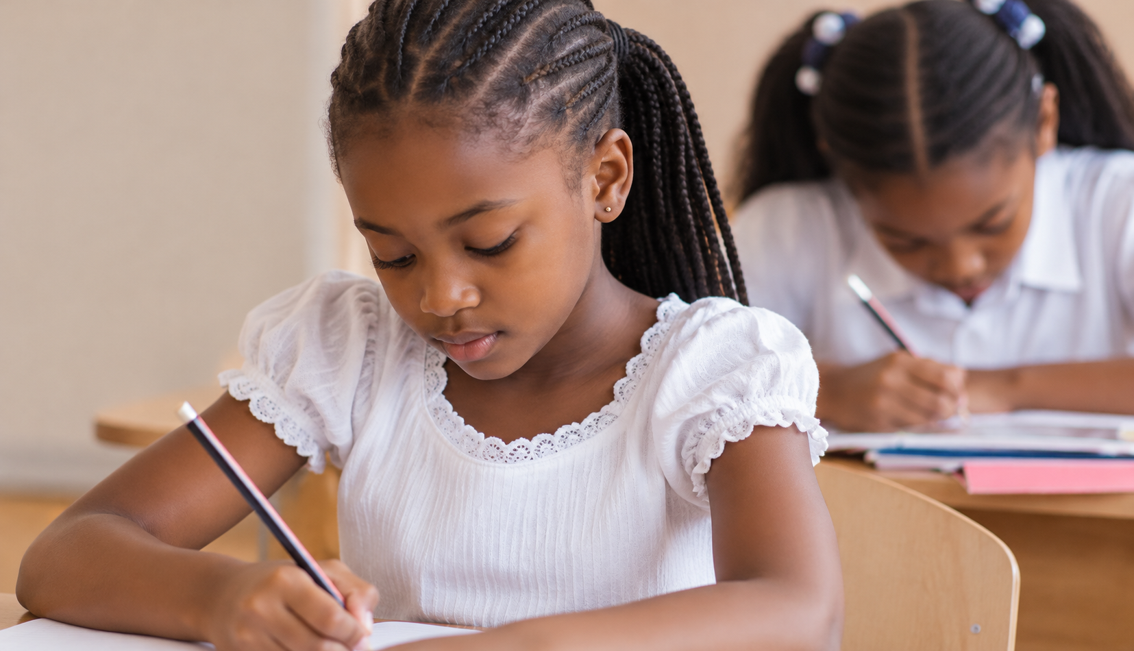A Yadah learner writing in class